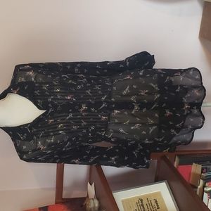 Sheer tunic length tie back shirt